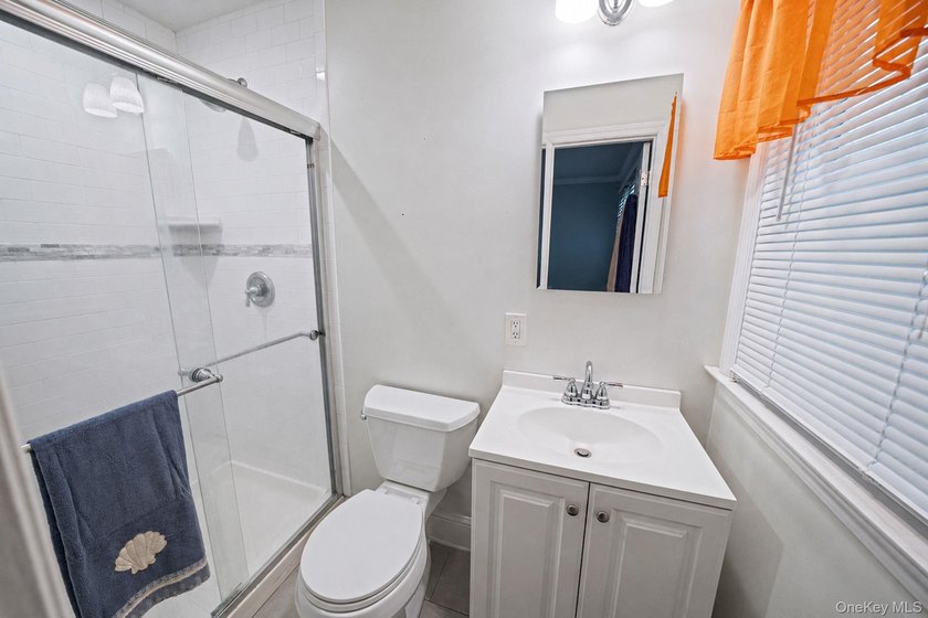 Nestled on a beautifully landscaped property surrounded by - photo 18