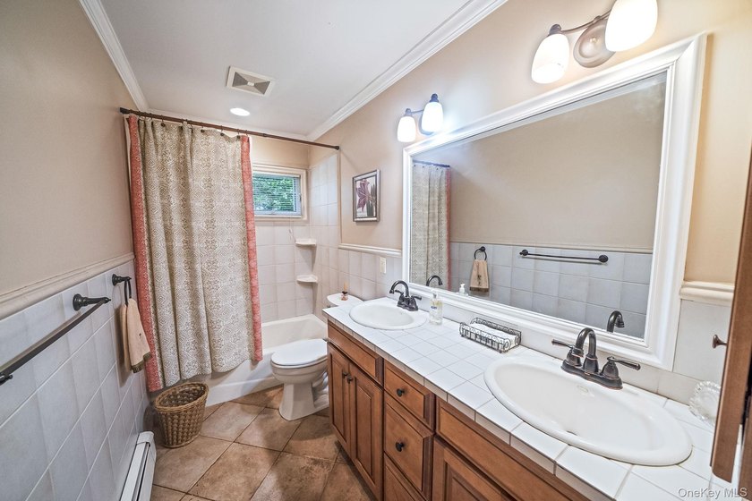 Nestled on a beautifully landscaped property surrounded by - photo 19