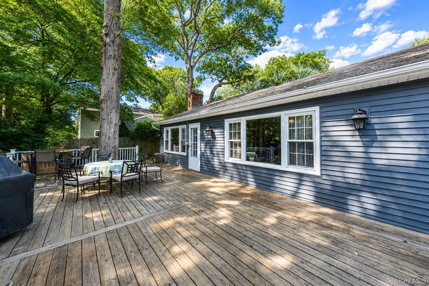 Nestled on a beautifully landscaped property surrounded by - photo 28