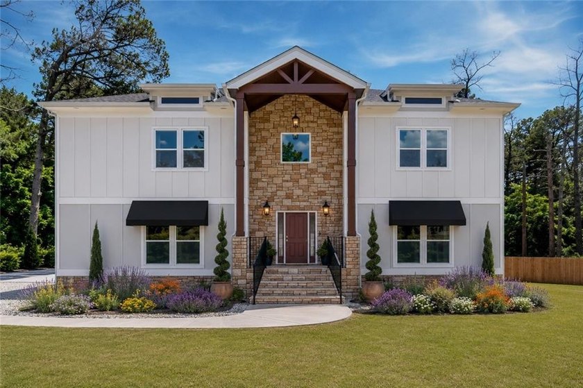 Escape the ordinary in this custom modern farmhouse, perfectly - photo 3