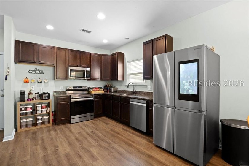 Offered at $400,000, this beautifully maintained 4-bedroom, 2 - photo 12