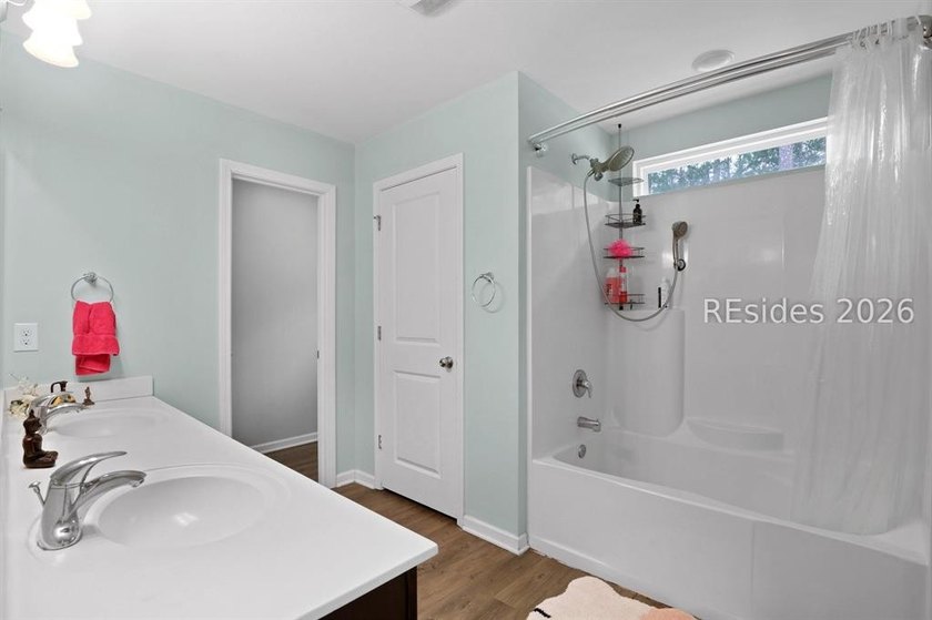 Offered at $400,000, this beautifully maintained 4-bedroom, 2 - photo 24