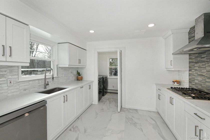 Welcome to 34 Warner Road, Huntington NY. This totally renovated - photo 19