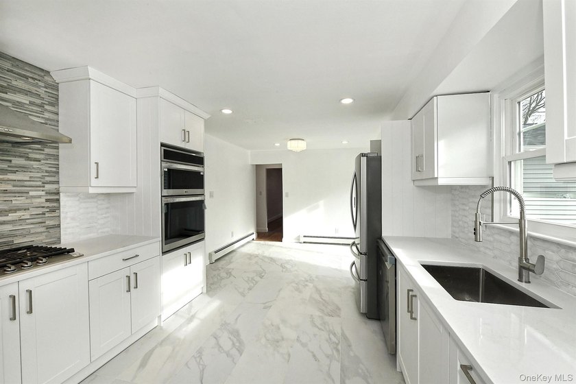 Welcome to 34 Warner Road, Huntington NY. This totally renovated - photo 21