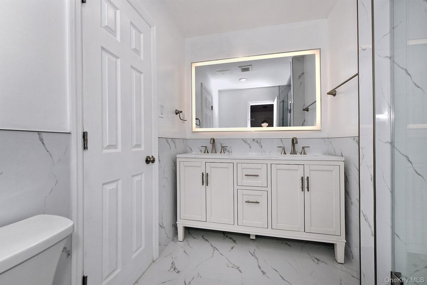 Welcome to 34 Warner Road, Huntington NY. This totally renovated - photo 30