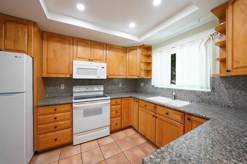 PRIME LOCATION at Bernardo Villas with an end unit facing the - photo 15
