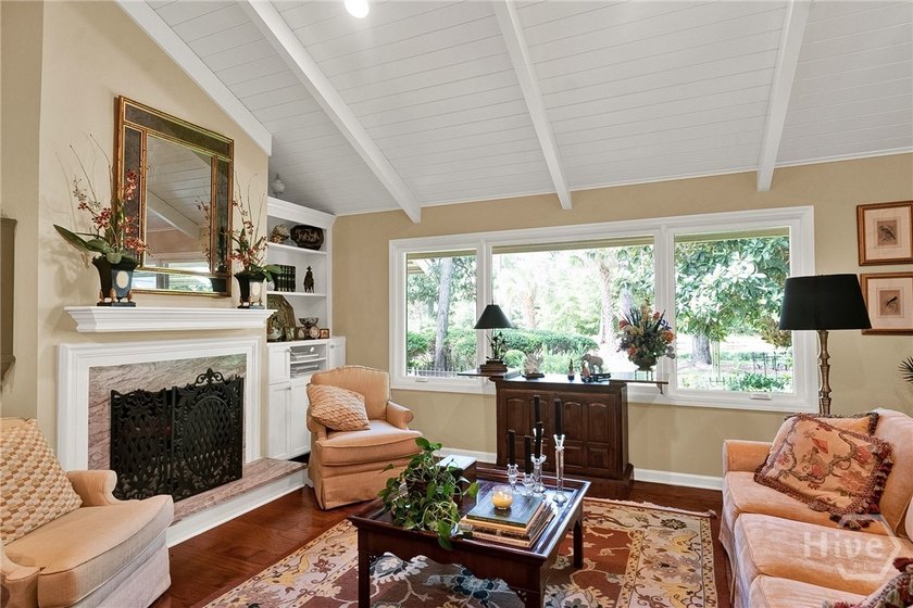 This exceptionally updated, one-level end unit on the lagoon is - photo 14