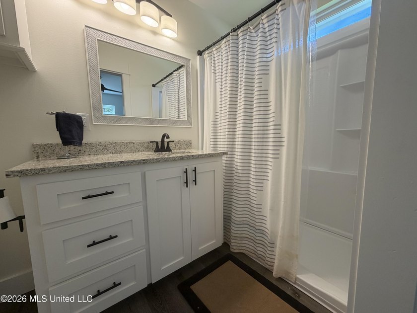 Completely remodeled inside and out, this waterfront coastal - photo 19