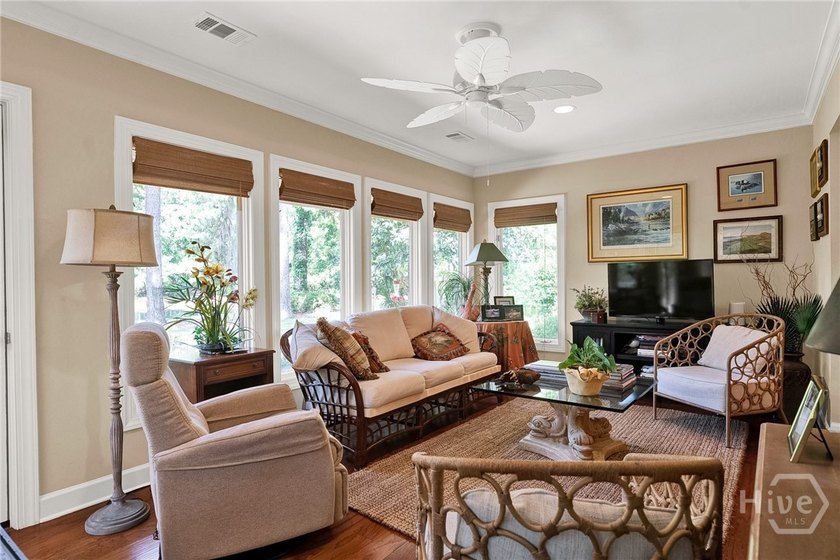 This exceptionally updated, one-level end unit on the lagoon is - photo 21