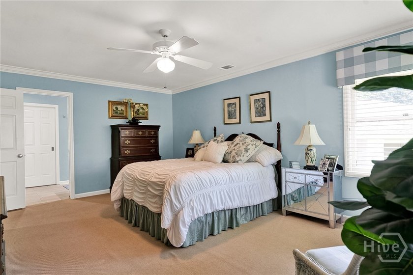 This exceptionally updated, one-level end unit on the lagoon is - photo 22