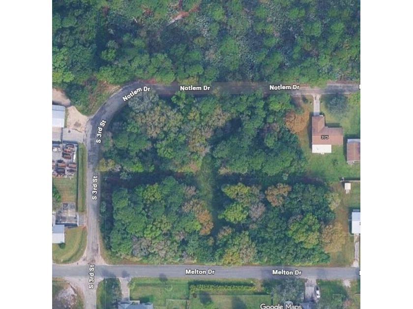 48 Acre corner lot located in the well established area of - photo 2