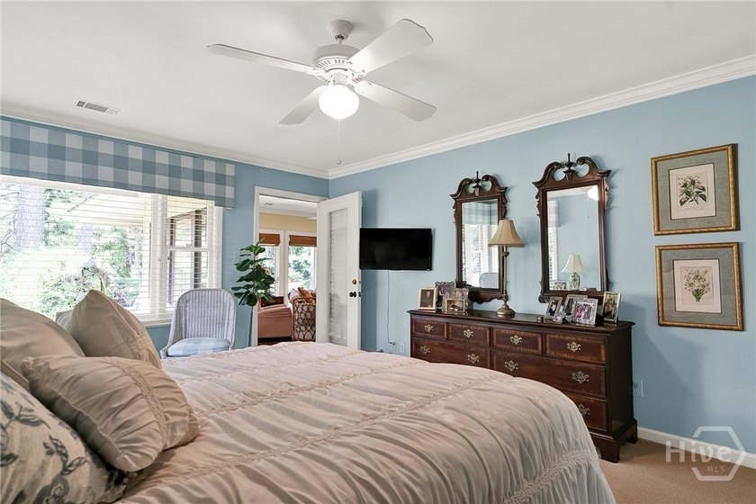 This exceptionally updated, one-level end unit on the lagoon is - photo 23