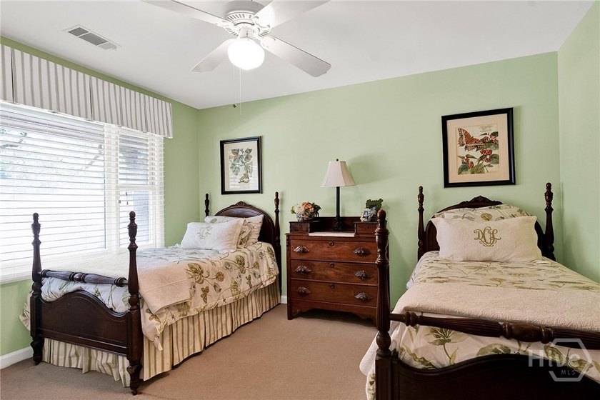 This exceptionally updated, one-level end unit on the lagoon is - photo 27