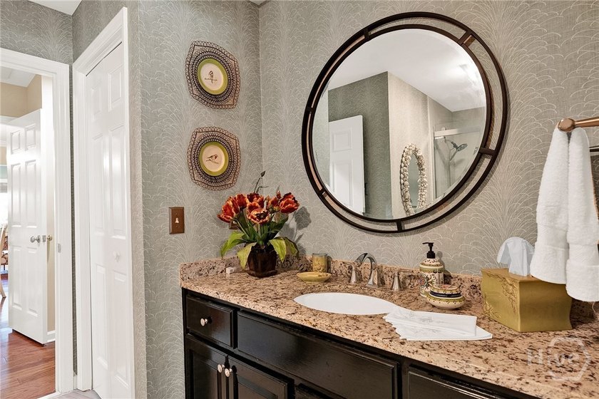 This exceptionally updated, one-level end unit on the lagoon is - photo 28