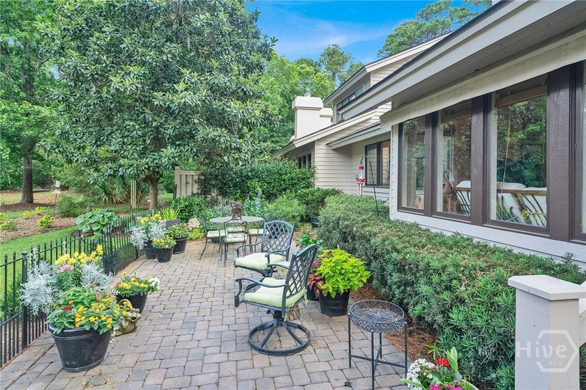 This exceptionally updated, one-level end unit on the lagoon is - photo 32