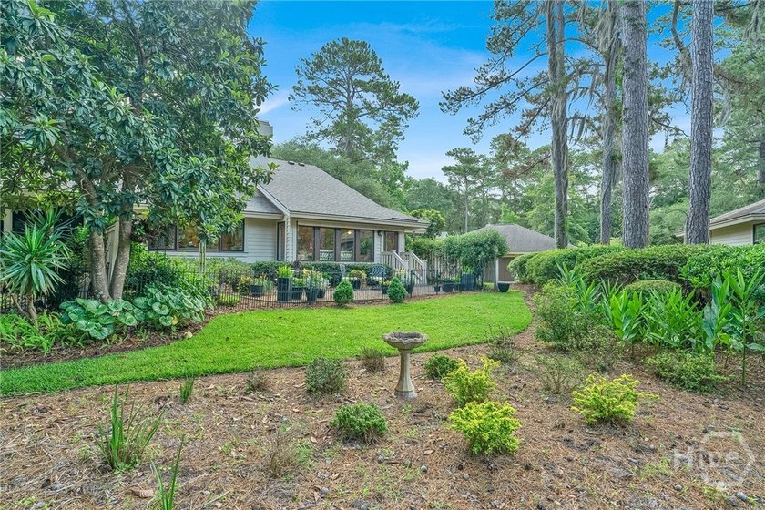 This exceptionally updated, one-level end unit on the lagoon is - photo 33