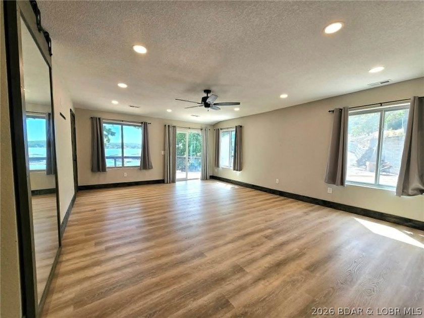 Beautifully positioned near the water's edge, this fully - photo 21
