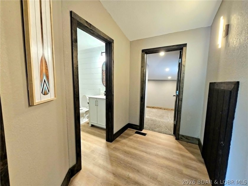 Beautifully positioned near the water's edge, this fully - photo 29