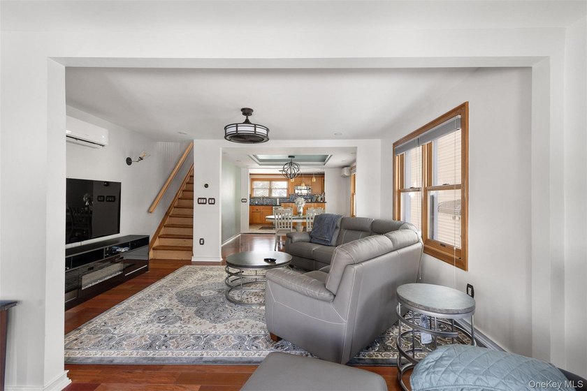 This well maintained multi-level home features hardwood floors - photo 2