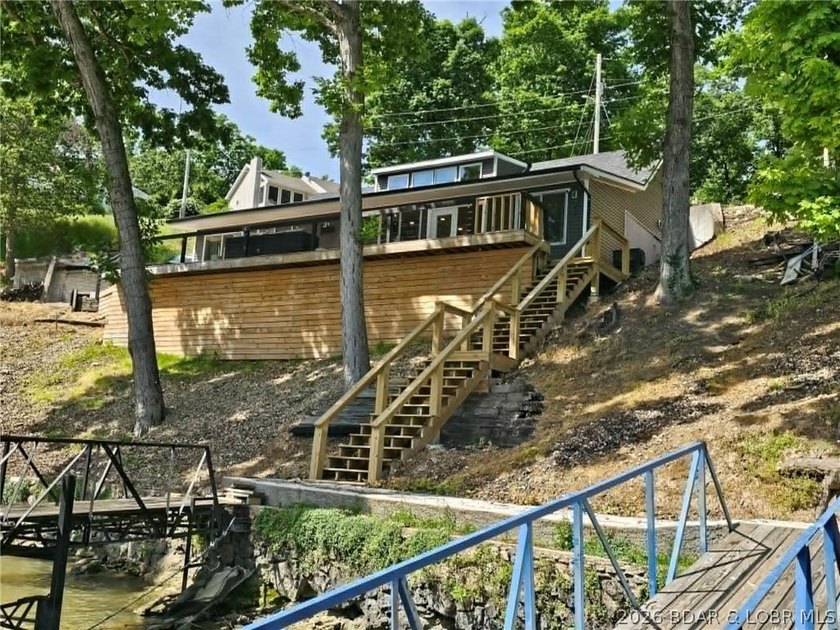 Beautifully positioned near the water's edge, this fully - photo 43