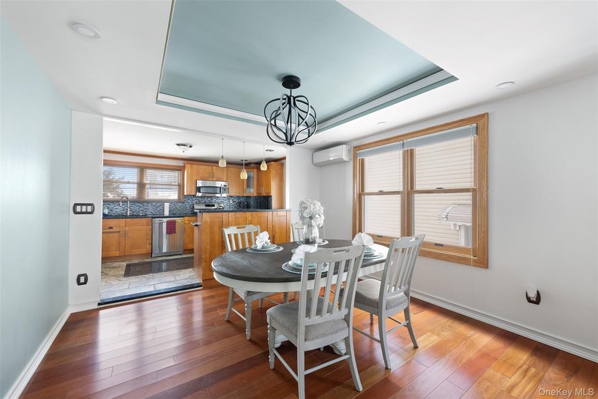 This well maintained multi-level home features hardwood floors - photo 5