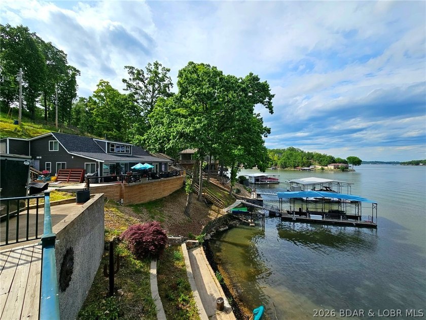 Beautifully positioned near the water's edge, this fully - photo 49