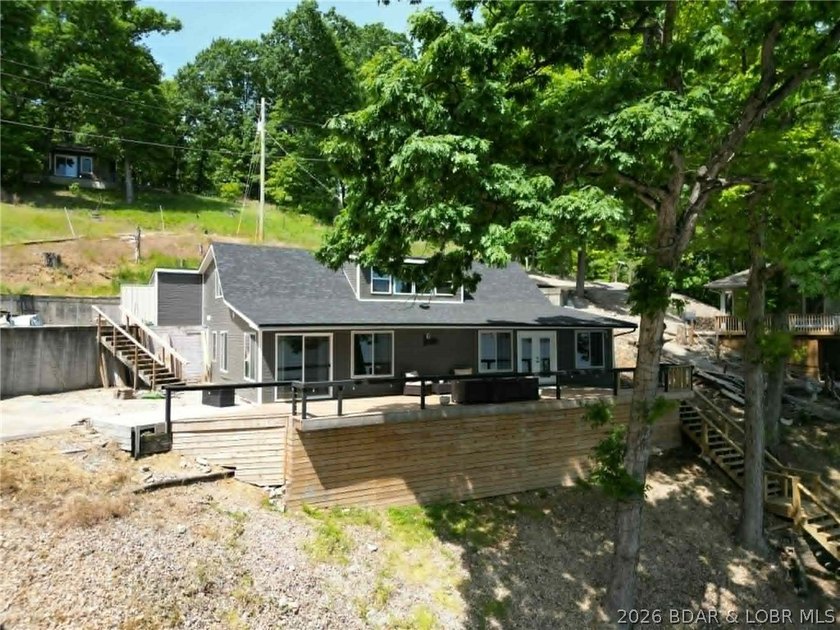 Beautifully positioned near the water's edge, this fully - photo 50