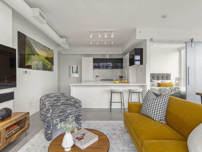 Perched on the coveted NW comer of the sub-penthouse level, this - photo 12