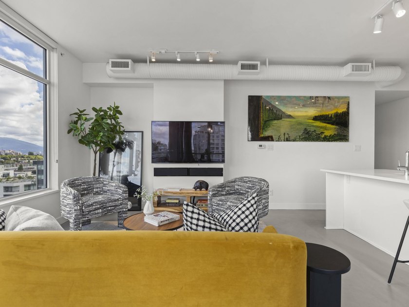 Perched on the coveted NW comer of the sub-penthouse level, this - photo 14