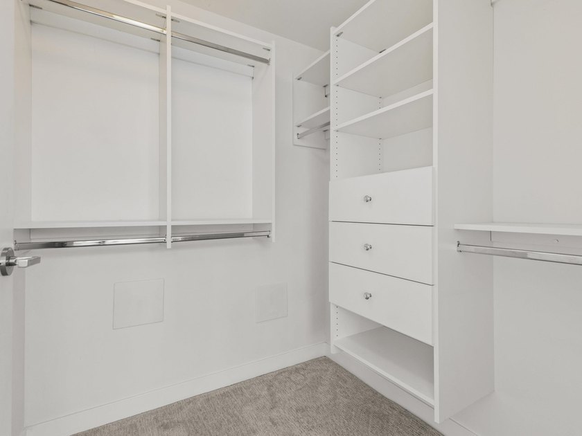 Perched on the coveted NW comer of the sub-penthouse level, this - photo 31