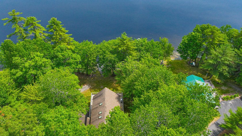 Discover the perfect blend of privacy and lakefront living in - photo 33