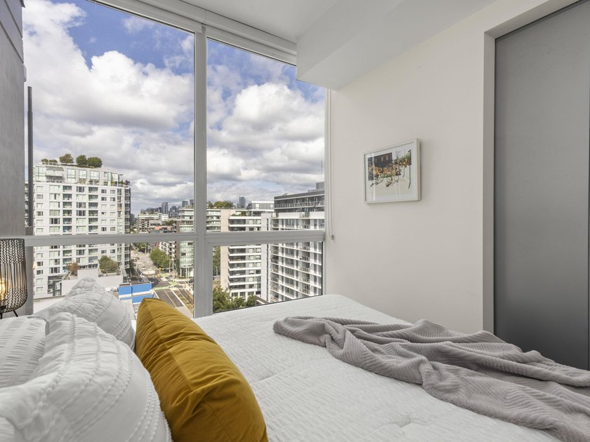Perched on the coveted NW comer of the sub-penthouse level, this - photo 34