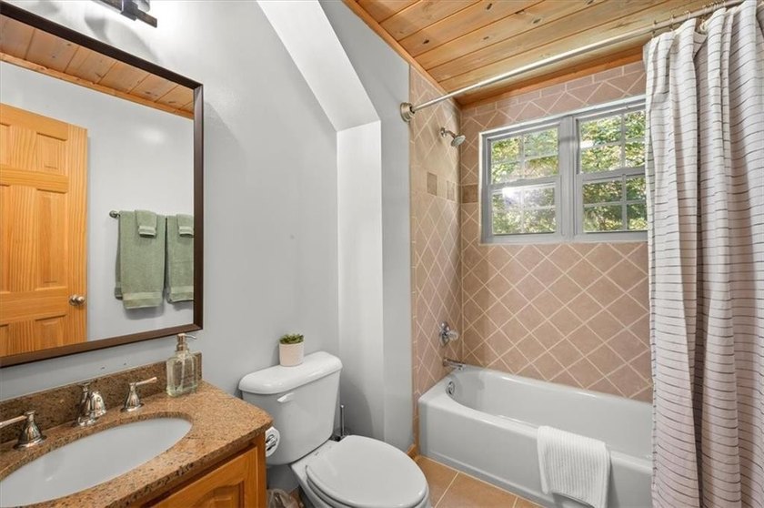 Stunning 3 bed 3 bath log cabin on 2.82 acres of serenity with a - photo 27