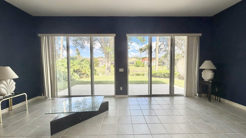 This well-designed home features 12-foot ceilings in the great - photo 3