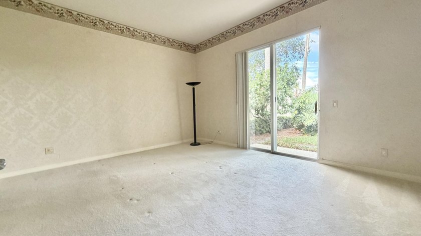 This well-designed home features 12-foot ceilings in the great - photo 9