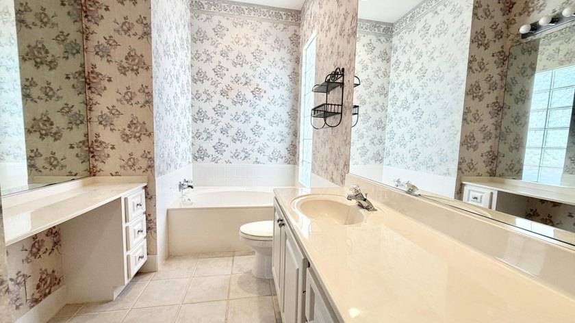 This well-designed home features 12-foot ceilings in the great - photo 10