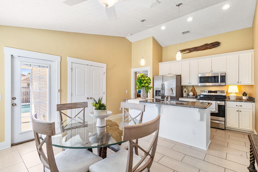 This well-located 3-bedroom, 2-bathroom home on the highly - photo 13