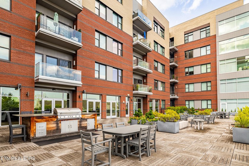 Live in the heart of downtown Knoxville at Regas Square! This - photo 30