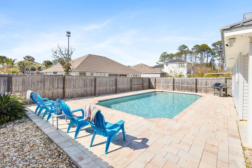 This well-located 3-bedroom, 2-bathroom home on the highly - photo 34