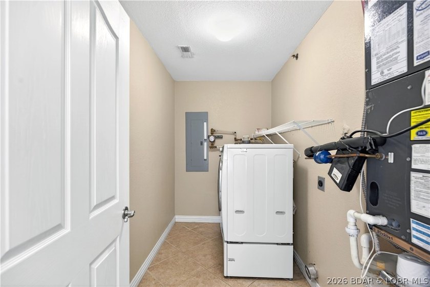Experience effortless lakefront living at Majestic Pointe, an - photo 35
