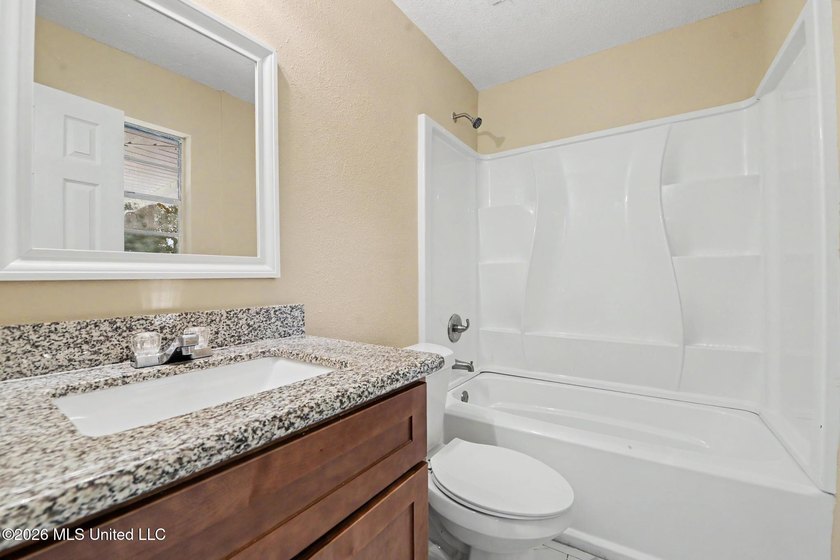 Welcome to this charming 3-bedroom, 2-bath home offering - photo 12