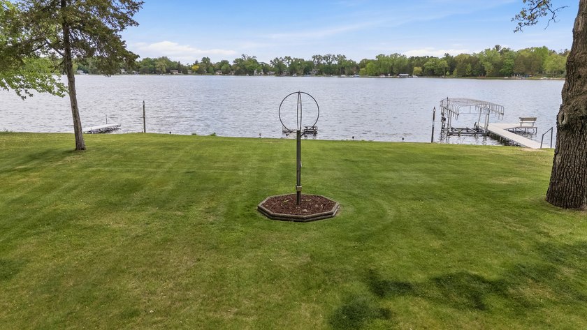 65 ft of level frontage on beautiful Pretty Lake with sunrise - photo 5