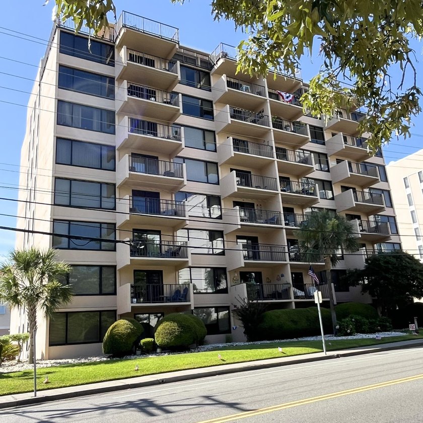Just a short walk to the beach, this updated second-floor condo - photo 33