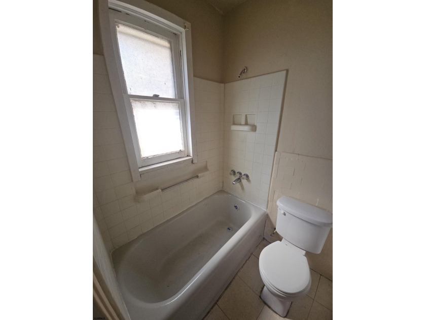 Prime Location with Exceptional Potential! This 3-bedroom - photo 34