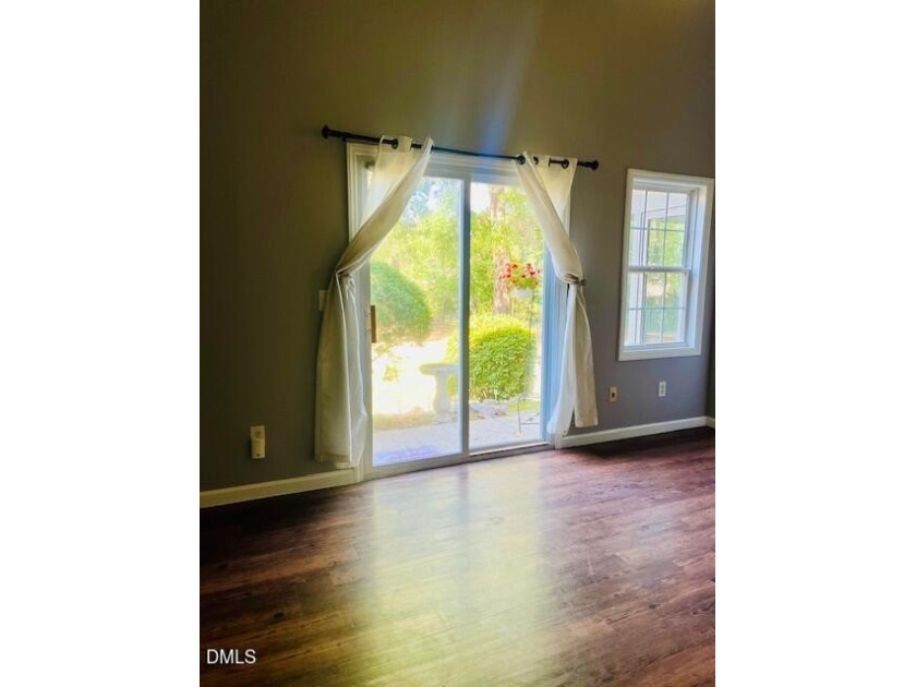 Enjoy beautiful lake views from the spacious sunroom and private - photo 8
