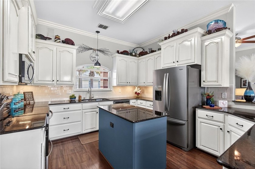 WELCOME to 15826 Almeria Ave, a beautifully appointed coastal - photo 14