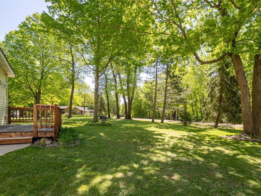 Discover tranquility in the Heart of the Lakes! Situated on a - photo 39