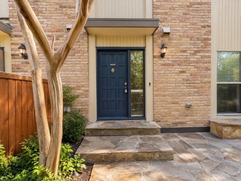 Welcome to this beautifully updated condo tucked away in the - photo 2