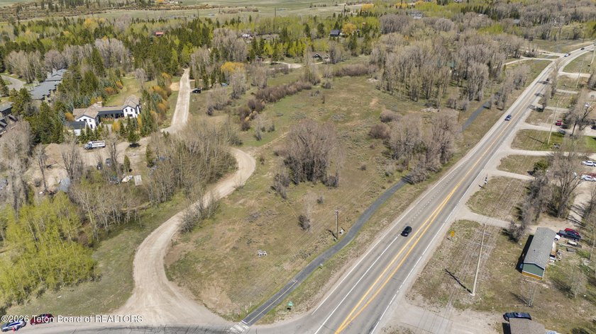 Set on 5 pristine acres in Jackson Hole, WY 83001 this - photo 11