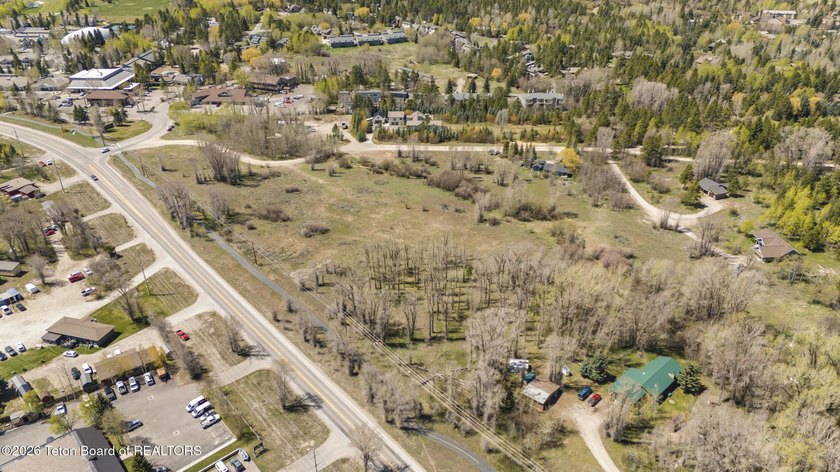 Set on 5 pristine acres in Jackson Hole, WY 83001 this - photo 13